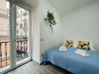 Letto o letti in una camera di Casa Duomo