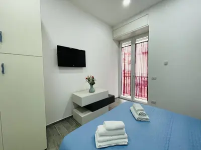 Letto o letti in una camera di Casa Duomo