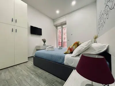 Letto o letti in una camera di Casa Duomo