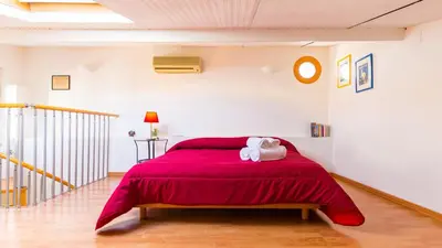 Letto o letti in una camera di Terrazza San Paolo by Napoliapartments