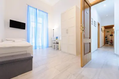 Letto o letti in una camera di Via Aniello Falcone 72b