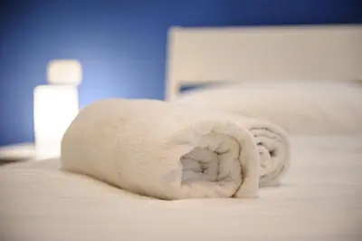 Letto o letti in una camera di Via Aniello Falcone 72b