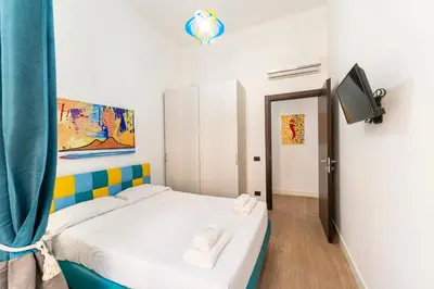 Letto o letti in una camera di Casa di Rosy