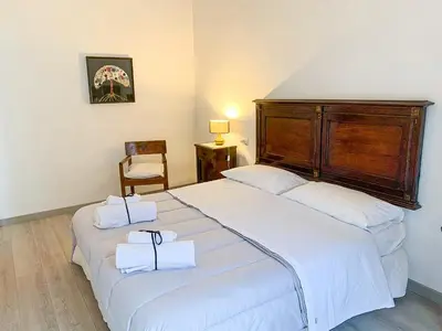 Letto o letti in una camera di Le Casette di Piazza Borsa