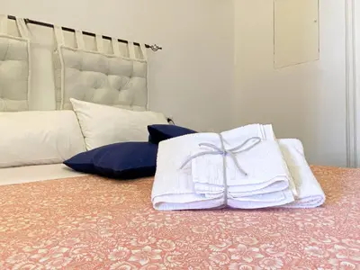 Letto o letti in una camera di Le Casette di Piazza Borsa