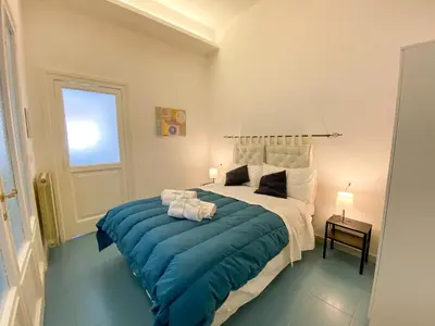 Letto o letti in una camera di Le Casette di Piazza Borsa