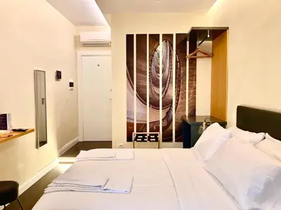 Letto o letti in una camera di South Hands Luxury Rooms