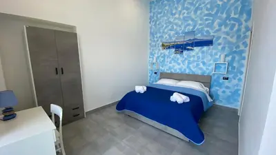 Letto o letti in una camera di HEART OF NAPLES