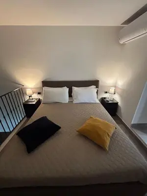 Letto o letti in una camera di Casina al duomo