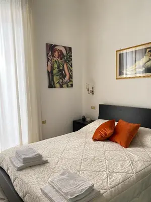 Letto o letti in una camera di Residenze Pessina