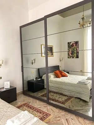Letto o letti in una camera di Residenze Pessina