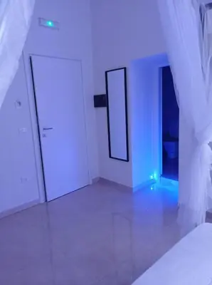 Letto o letti in una camera di RELAIS TORRE GLORIA