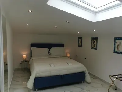 Letto o letti in una camera di Royal Boutique Napoli