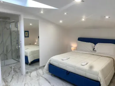 Letto o letti in una camera di Royal Boutique Napoli