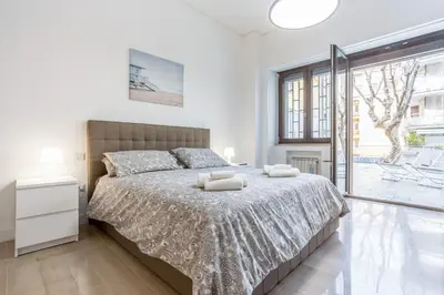 Letto o letti in una camera di GuestHost - Vomero Deluxe Apartments