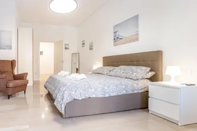 Letto o letti in una camera di GuestHost - Vomero Deluxe Apartments