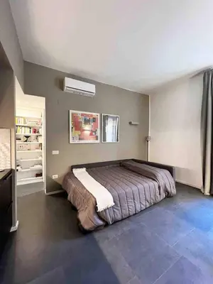 Letto o letti in una camera di Pizzofalcone27