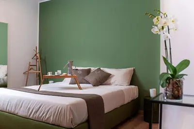 Letto o letti in una camera di Neocore