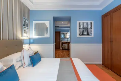 Letto o letti in una camera di Palazzo Turchini