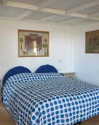 Letto o letti in una camera di Bonbonniere in Chiaia district