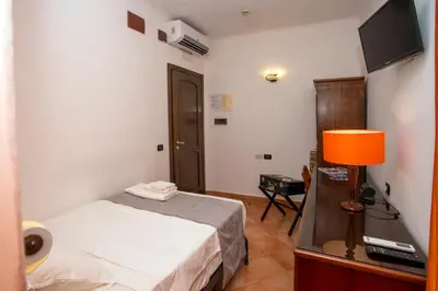 Letto o letti in una camera di Hotel Neapolis