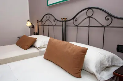 Letto o letti in una camera di Hotel Neapolis