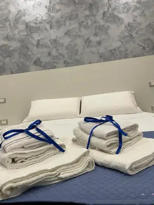 Letto o letti in una camera di 3 Rooms Chiaia