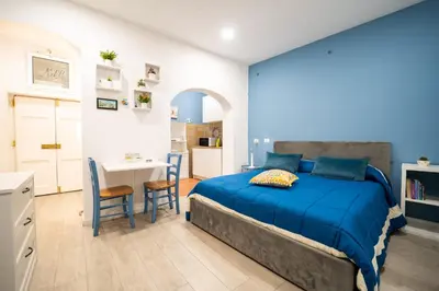 Letto o letti in una camera di Casa milù