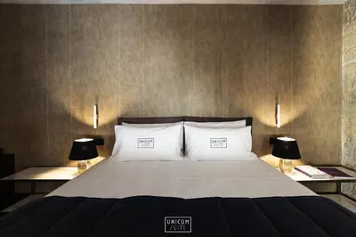 Letto o letti in una camera di Unicum Suite Napoli Centro Storico