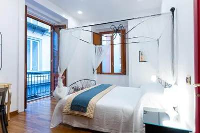 Letto o letti in una camera di Dimora del Fico - Appartamento elegante e spazioso