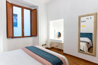 Letto o letti in una camera di Dimora del Fico - Appartamento elegante e spazioso