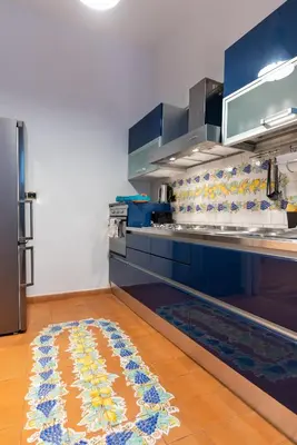Cucina o angolo cottura di Dimora del Fico - Appartamento elegante e spazioso