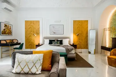 Letto o letti in una camera di The Marble House - Family and Friends Luxury Apartment in Naples