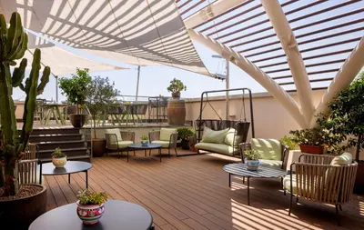 Area soggiorno di UNA Hotels Napoli