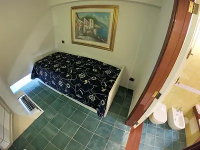 Letto o letti in una camera di Hotel Ausonia