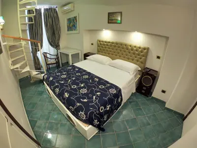 Letto o letti in una camera di Hotel Ausonia