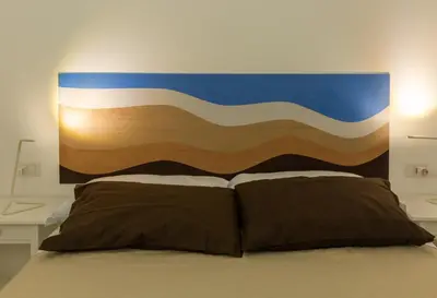 Letto o letti in una camera di Il Vicoletto del Castello