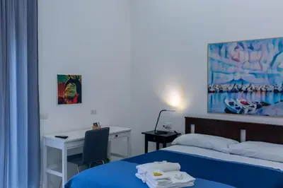 Letto o letti in una camera di Il Vicoletto del Castello