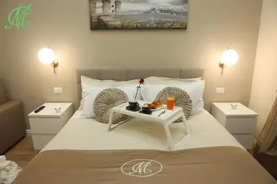 Letto o letti in una camera di MC Apartments