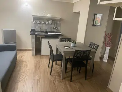 Cucina o angolo cottura di SOTTOSOPRA APARTMENT