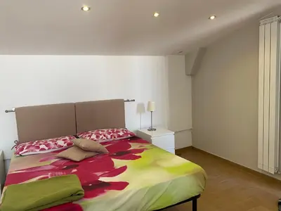 Letto o letti in una camera di Three Kings Home