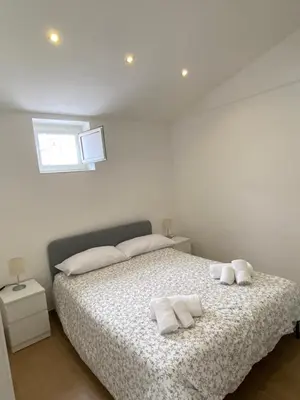 Letto o letti in una camera di Three Kings Home