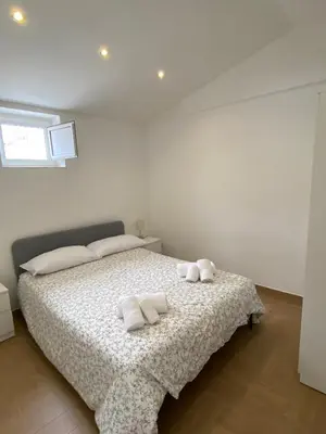 Letto o letti in una camera di Three Kings Home
