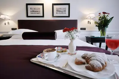 Letto o letti in una camera di Grand Hotel Oriente