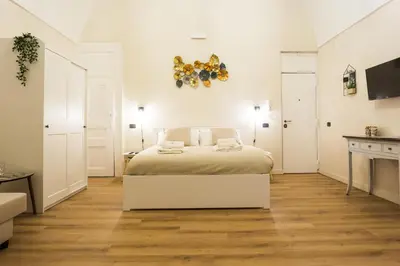 Letto o letti in una camera di Residenza Sforza Apartment 1
