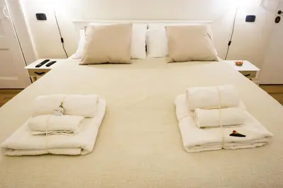 Letto o letti in una camera di Residenza Sforza Apartment 1