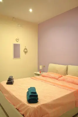 Letto o letti in una camera di San Gregorio Apartment