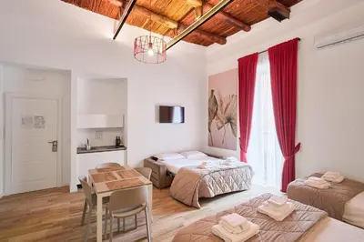 Letto o letti in una camera di Toto e Peppino Luxury Rooms