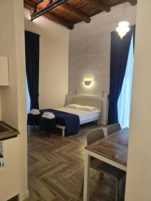 Letto o letti in una camera di Toto e Peppino Luxury Rooms