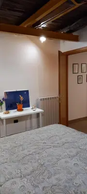 Letto o letti in una camera di CASALAURETTA